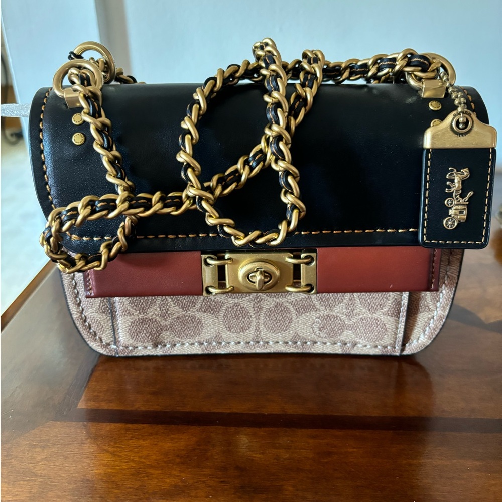 COACH troupe Crossbody bag in signature canvas. Brand new. Duster included